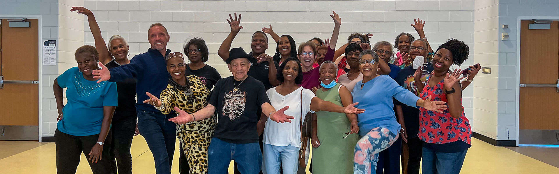 County Executive David Coulter dances with the Oak Park Senior Steppers.