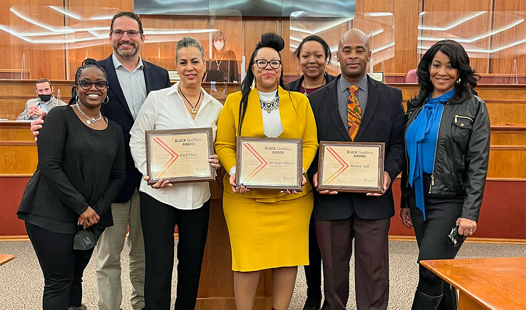 Four Oakland County commissioners presents Black Excellence Awards to three constituents