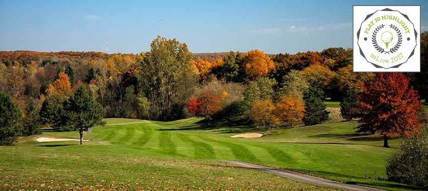 Springfield Oaks Golf Course in autumn with colorful trees.