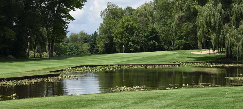 Serene pond at Springfield Oaks Golf Course displays an amazing topography.