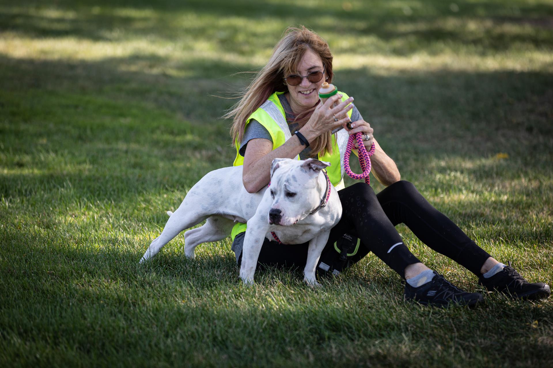 Woman hugging dog