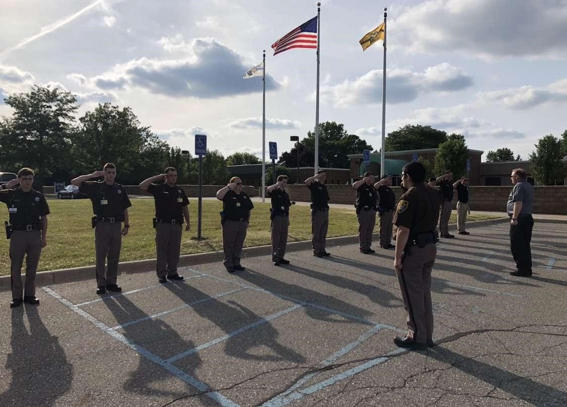 Cadets saluting officers